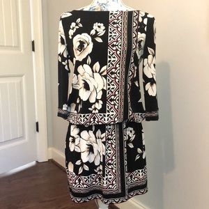 White House/Black Market short dress. Elastic at waist so it flounces over.